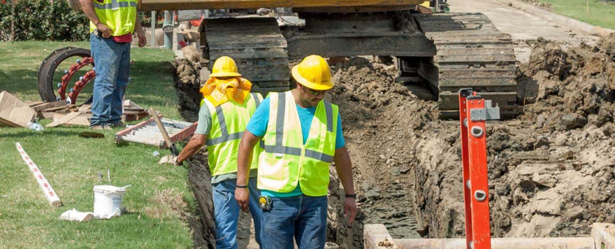 team working on dig site for Rochelle Blvd